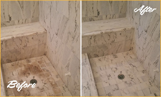 Before and After Picture of a Dirty Marietta Marble Shower Cleaned to Eliminate Dark Stains