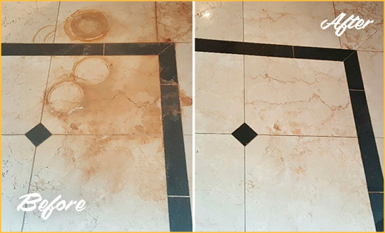 Before and After Picture of a Dunwoody Marble Floor Cleaned to Eliminate Rust Stains